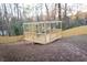 Backyard featuring deck in a wooded backyard with a privacy fence for added tranquility at 3490 Primrose Pl, Decatur, GA 30032