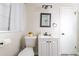 Well-lit bathroom showcasing a modern vanity, toilet, and an updated shower at 3490 Primrose Pl, Decatur, GA 30032