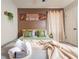 Bedroom featuring plush bedding, decorative pillows, modern textures and stylish curtains at 3490 Primrose Pl, Decatur, GA 30032