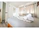 Comfortable bedroom featuring plush bedding, decorative pillows, and stylish curtains at 3490 Primrose Pl, Decatur, GA 30032
