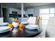 Open dining area connecting to the kitchen with bar stool seating at 3490 Primrose Pl, Decatur, GA 30032