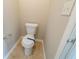 Powder room featuring a white toilet and chrome hardware at 493 Townsend Bnd, Stockbridge, GA 30281
