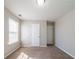 Bedroom featuring neutral walls, carpet flooring, and a window at 493 Townsend Bnd, Stockbridge, GA 30281