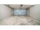 A garage with a concrete floor and an automatic garage door at 493 Townsend Bnd, Stockbridge, GA 30281