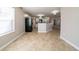 Open-concept dining and kitchen space, bright and airy with neutral colors at 493 Townsend Bnd, Stockbridge, GA 30281
