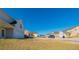 A quiet street with well-maintained lawns and various home styles at 493 Townsend Bnd, Stockbridge, GA 30281