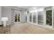 Bright bedroom features custom built-ins and large windows with views of mature trees at 5323 Presley Pl, Douglasville, GA 30135