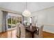 Dining room features chandelier and a view of the outdoors at 5323 Presley Pl, Douglasville, GA 30135