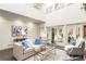 Bright living room featuring comfortable seating, stylish decor, and ample natural light at 5323 Presley Pl, Douglasville, GA 30135