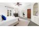 Main bedroom features a king bed, natural light, and neutral-toned decor at 5323 Presley Pl, Douglasville, GA 30135