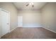 Bedroom with vaulted ceilings and neutral colors at 6797 Mahonia Pl, Lithonia, GA 30038