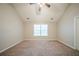 Cozy bedroom with soft carpeting and plenty of natural light at 6797 Mahonia Pl, Lithonia, GA 30038