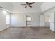A large main bedroom boasts an expansive layout and plush carpeting with a connected bathroom at 1011 Buckhorn Bnd, Locust Grove, GA 30248