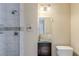 Bathroom featuring stylish shower, glass sink, new lighting and modern fixtures at 3119 Bellgreen Way, Decatur, GA 30032