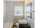 Bathroom featuring a tile shower, vessel sink, and modern vanity at 3119 Bellgreen Way, Decatur, GA 30032