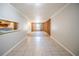 Dining room with tile floors, a pass-through to the kitchen, and visible wall framing at 3524 Exeter Ct, Snellville, GA 30039