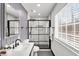 Modern bathroom featuring a sleek glass shower and a contemporary vanity at 4041 Blanton Sw Ave, Atlanta, GA 30331