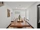Inviting dining room with a rustic wooden table, comfortable seating, and elegant decor at 4041 Blanton Sw Ave, Atlanta, GA 30331