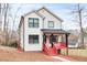 Charming two-story home with a cozy front porch, black accents, and neat landscaping at 4041 Blanton Sw Ave, Atlanta, GA 30331