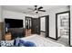 Spacious main bedroom with a TV and ensuite bathroom at 4041 Blanton Sw Ave, Atlanta, GA 30331