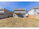 Backyard featuring a patio and wood fence and view of neighborhood houses at 7434 Rudder Cir, Fairburn, GA 30213