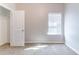 Bedroom featuring plush carpet, a bright window and closet at 7434 Rudder Cir, Fairburn, GA 30213
