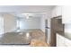 Modern kitchen leading into living room with stainless steel appliances at 7434 Rudder Cir, Fairburn, GA 30213