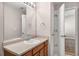 Bathroom with white marble floor and a wooden vanity at 805 Pleasant Hill Rd # 171, Lilburn, GA 30047