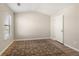 Bright room with luxury vinyl flooring and a large window at 805 Pleasant Hill Rd # 171, Lilburn, GA 30047
