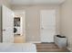 Bright laundry room with a white washer and dryer visible through the open doorway at 805 Pleasant Hill Rd # 171, Lilburn, GA 30047