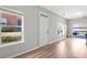 Bright living area with wood floors and views of the exterior at 805 Pleasant Hill Rd # 171, Lilburn, GA 30047