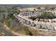 Expansive aerial view of a well-planned neighborhood surrounded by mature trees and green spaces at 131 Riverside Ln, Woodstock, GA 30188