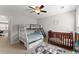 Bedroom includes bunk beds and a crib in open plan layout at 131 Riverside Ln, Woodstock, GA 30188