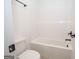 Bright white bathroom featuring a tub and sleek matte black hardware at 255 Olde Oak Dr, Jonesboro, GA 30238