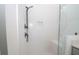 Modern bathroom shower with glass door, shower seat, and sleek shower fixture at 255 Olde Oak Dr, Jonesboro, GA 30238