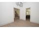 Open-concept design with the dining room leading to a staircase and kitchen at 255 Olde Oak Dr, Jonesboro, GA 30238