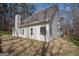 A beautiful home exterior showcases a well-maintained yard, architectural roof line, and energy-efficient windows at 255 Olde Oak Dr, Jonesboro, GA 30238