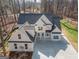 Beautiful two-story home with a modern design and a spacious concrete driveway at 255 Olde Oak Dr, Jonesboro, GA 30238