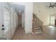 Foyer leading to living area and stairway, featuring sleek flooring and lots of natural light at 255 Olde Oak Dr, Jonesboro, GA 30238
