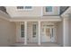 Charming entrance with white columns and front door at 255 Olde Oak Dr, Jonesboro, GA 30238