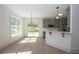 Eat-in kitchen with stainless appliances, view to the backyard and natural light at 255 Olde Oak Dr, Jonesboro, GA 30238