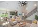 Living room with staircase and a view into the kitchen at 255 Olde Oak Dr, Jonesboro, GA 30238