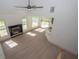 Aerial view of open concept living space with fireplace and eat-in kitchen at 255 Olde Oak Dr, Jonesboro, GA 30238