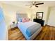 Light and airy bedroom featuring light-colored walls and a bed with decorative pillows at 445 Griffin St, Atlanta, GA 30318