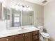 Bathroom featuring a sink, vanity, and shower-tub combo at 554 Sherwood Oaks Rd, Stone Mountain, GA 30087