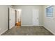 Bedroom with a walk-in closet and a neutral color palette at 554 Sherwood Oaks Rd, Stone Mountain, GA 30087