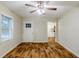 Open living room has lots of light and a view of the kitchen at 554 Sherwood Oaks Rd, Stone Mountain, GA 30087