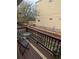 A quaint balcony features cozy seating and provides serene outdoor relaxation at 561 Formwalt Sw St # 12, Atlanta, GA 30312