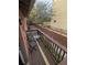 A quaint balcony features cozy seating and provides serene outdoor relaxation at 561 Formwalt Sw St # 12, Atlanta, GA 30312