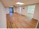Spacious basement with wood-look floors, walkout door and bonus space at 6025 Ashbury Ln, Cumming, GA 30028